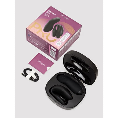 Black wireless toy with charging case and packaging on a light gray background